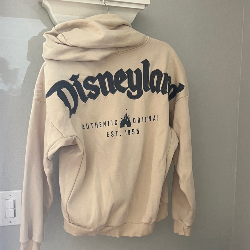 Disney tan zip up Hoodie Apparel with Black Accents- only worn once